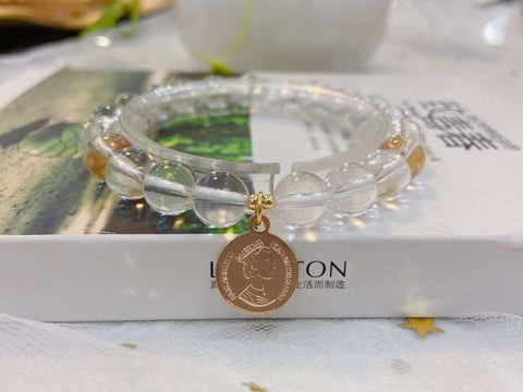 Natural white crystal 8mm bracelet with silver plated accessories