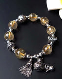 The natural 11mm yellow hair crystal bracelet, a treasure artifact, has the ability to attract wealt