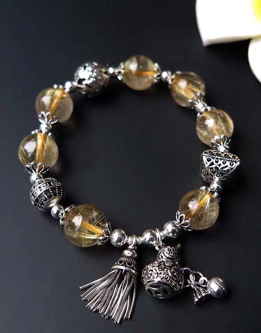 The natural 11mm yellow hair crystal bracelet, a treasure artifact, has the ability to attract wealt