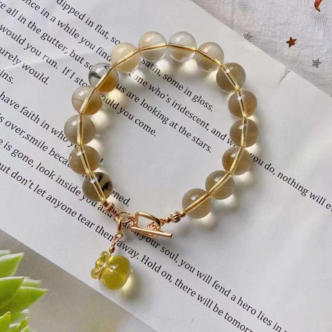 Natural Topaz 10m bracelet, with Topaz carved small purse and 14k gold