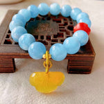 Natural sea blue treasure 11mm bracelet, with South Red Buddha head an