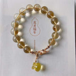 Natural Topaz 10m bracelet, with Topaz carved small purse and 14k gold