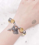The natural 11mm yellow hair crystal bracelet, a treasure artifact, has the ability to attract wealt