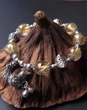 The natural 11mm yellow hair crystal bracelet, a treasure artifact, has the ability to attract wealt