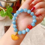 Natural sea blue treasure 11mm bracelet, with South Red Buddha head an