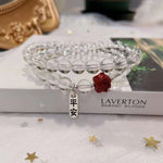 Natural white crystal 6mm two circle bracelet. With cinnabar cat paw p