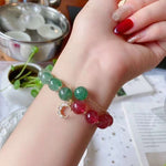 Natural red and green strawberry crystal 9mm bracelet with 14K Gold Mo
