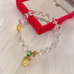 Natural cut white crystal 8mm bracelet, with honey wax cut face, topaz pineapple, 14K gold star