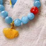 Natural sea blue treasure 11mm bracelet, with South Red Buddha head an