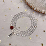 Natural white crystal 6mm two circle bracelet. With cinnabar cat paw p