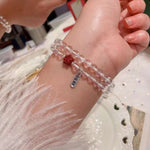 Natural white crystal 6mm two circle bracelet. With cinnabar cat paw p