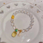 Natural cut white crystal 8mm bracelet, with honey wax cut face, topaz pineapple, 14K gold star