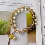 Natural Topaz 10m bracelet, with Topaz carved small purse and 14k gold