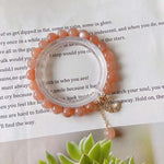 Natural sun stone 8mm bracelet with 14K gold wrapped little moon penda